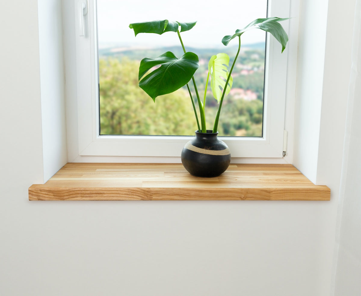 Aufsatzfensterbank Esche Mosaik versteckt alte Fensterbank innen. 